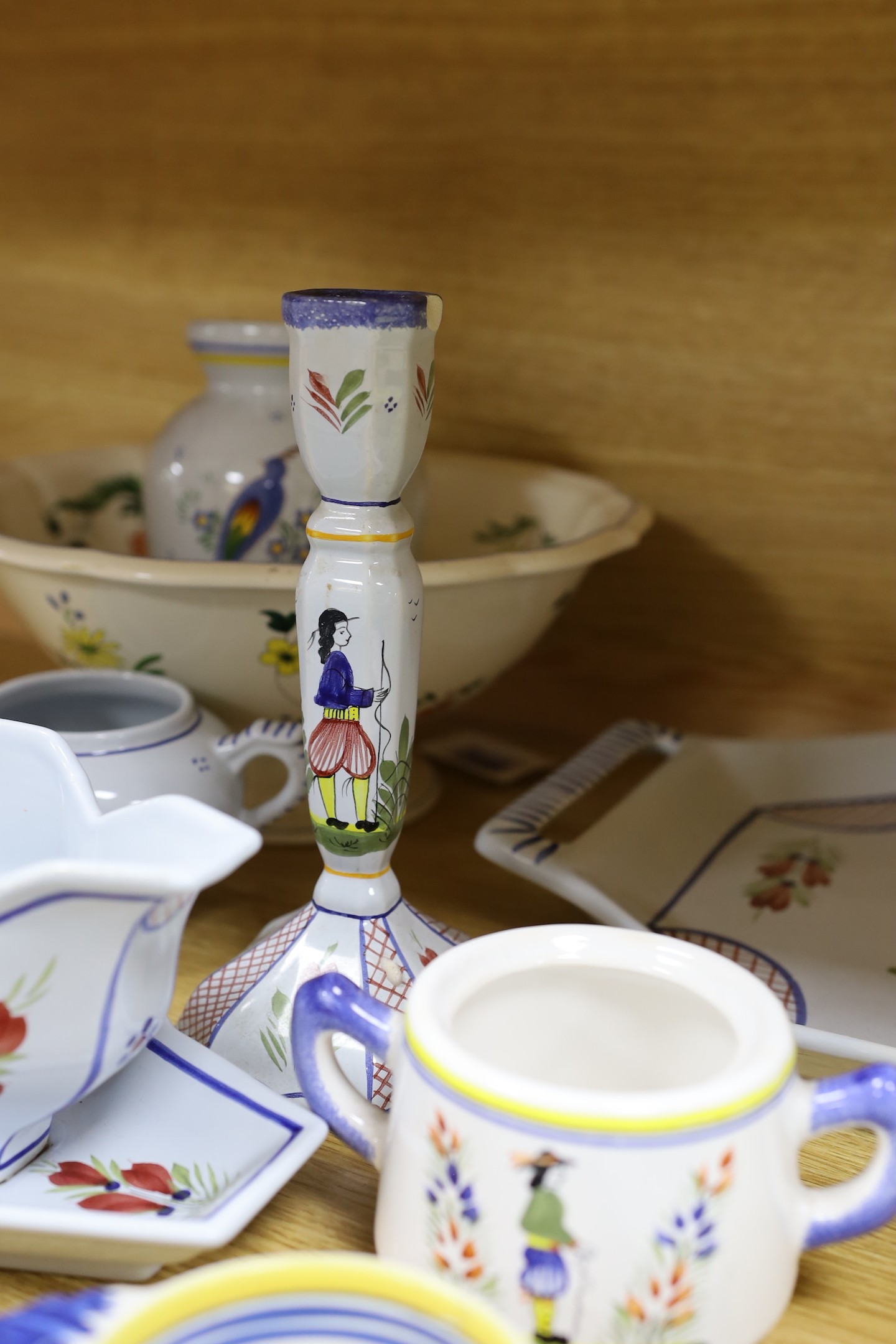 A collection of French Quimper tablewares